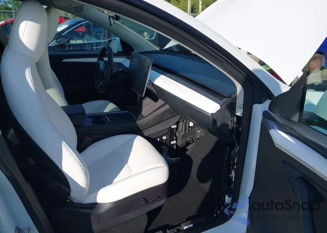 2023 Tesla Model Y Awd/Long Range Dual Motor All-Wheel Drive from USA, damaged, VIN 7SAYGAEE2PF640590